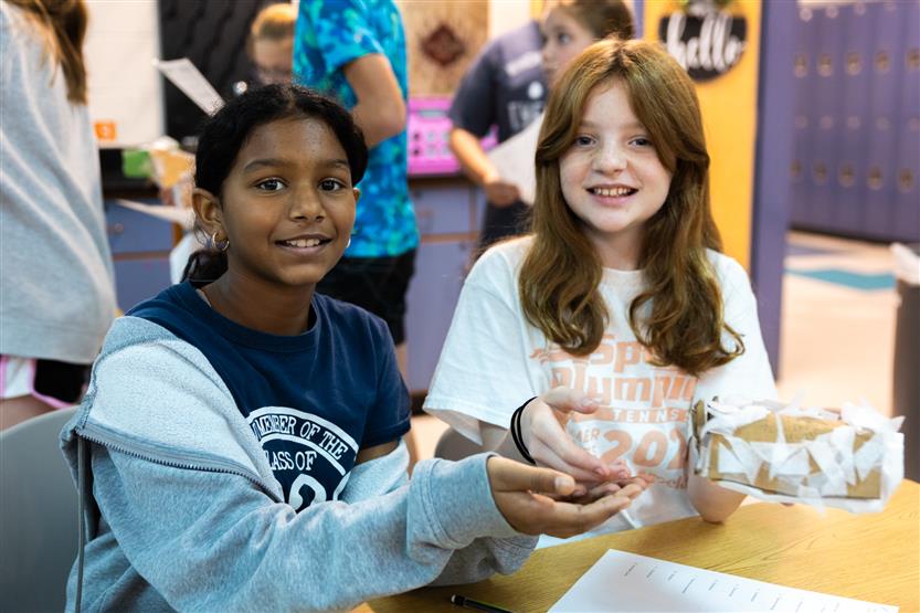 Students build penguin nests during an experiment